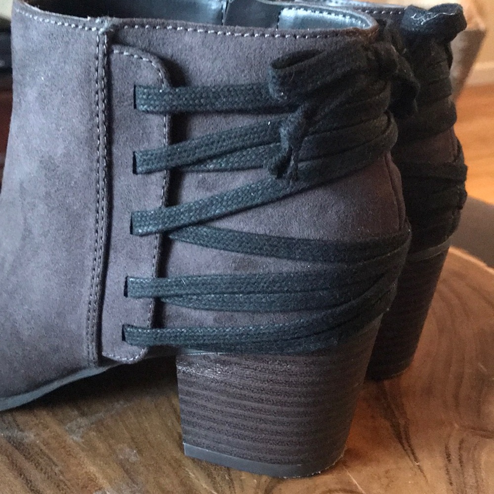 Suede booties lace up details zipper. Hardly worn